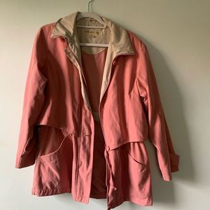 Soft pink London fog coat
